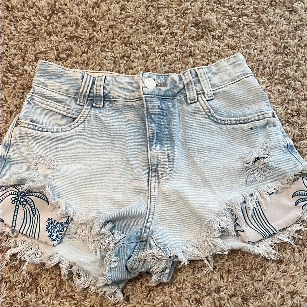 Distressed Light Blue Denim Shorts